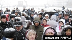 Participants march in snowy Astana today to protest the upcoming presidential election.