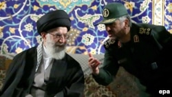 Iranian Supreme leader Ayatollah Ali Khamenei (left) listens to Islamic Revolutionary Guards Corps (IRGC) commander Mohammad Ali Jafari during a ceremony in Tehran in November.