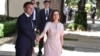 French President Emmanuel Macron (left) shakes hands with Moldovan President Maia Sandu in Chisinau on June 15.