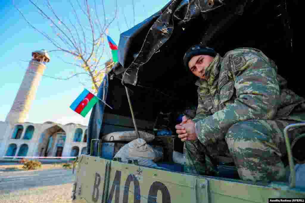 Azerbaijani soldiers in the town of Agdam on November 24&nbsp;