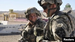 U.S. Staff Sergeant Robert Bales (left) trains at the National Training Center in Fort Irwin, California, in August 2011.