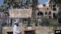 A man walks past the Jamia Haqqania seminary in Pakistan's Khyber Pakhtunkhwa Province (file photo)