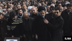 Iranian mourners attend the funeral of Masoud Ali Mohammadi, Iranian physics professor, in Tehran in January 2010.