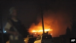 Kabul's Hotel Inter-Continental hotel is ablaze during the brazen June 29 attack.