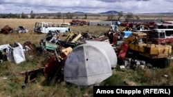 The two heads of the Statue Of Humanity lie in a municipal dump on the outskirts of Kars.