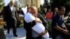 Timur Xaligov carries the body of his 10-month-old daughter Narin, who was killed with five other relatives, including her mother, Sevil, when a rocket hit their home in the city of Ganca, Azerbaijan, on October 17.