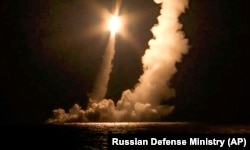 An ICBM is test-launched by a Russian nuclear submarine from the Sera of Okhotsk on December 12.