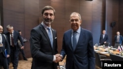 Slovak Foreign Minister Juraj Blanar (left) meets with his Russian counterpart, Sergei Lavrov, in Antalya, Turkey, on March 2. 