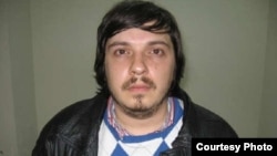 An Interpol picture of Alyaksandr Barankou, who is wanted in Belarus on bribery and fraud charges. 