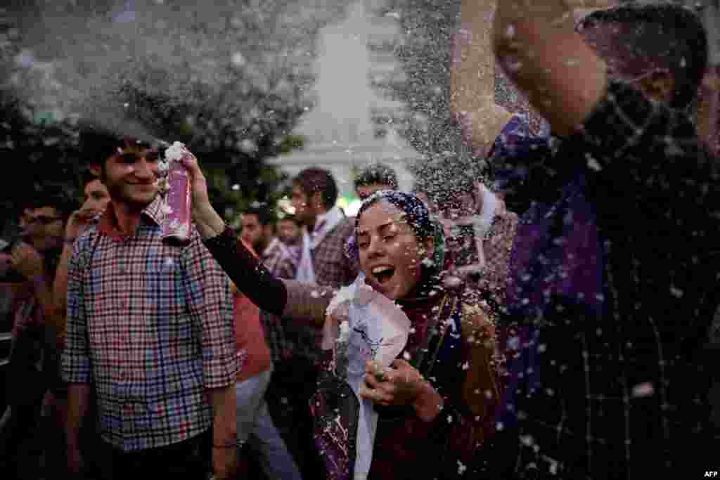 Celebrations along Vali Asr Street in Tehran after Rohani was declared the winner.