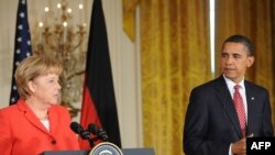 U.S President Barack Obama and German Chancellor Angela Merkel at a White House news conference.