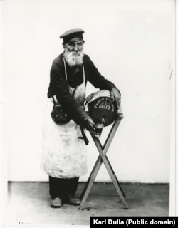 A man who sells chilled kvass -- a sweet, beer-like drink made from fermented black bread -- that is popular during Russian summers.