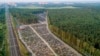 Fresh graves are seen at the Butovskoye cemetery outside Moscow, which serves as one of the burial grounds for those who died of COVID-19.