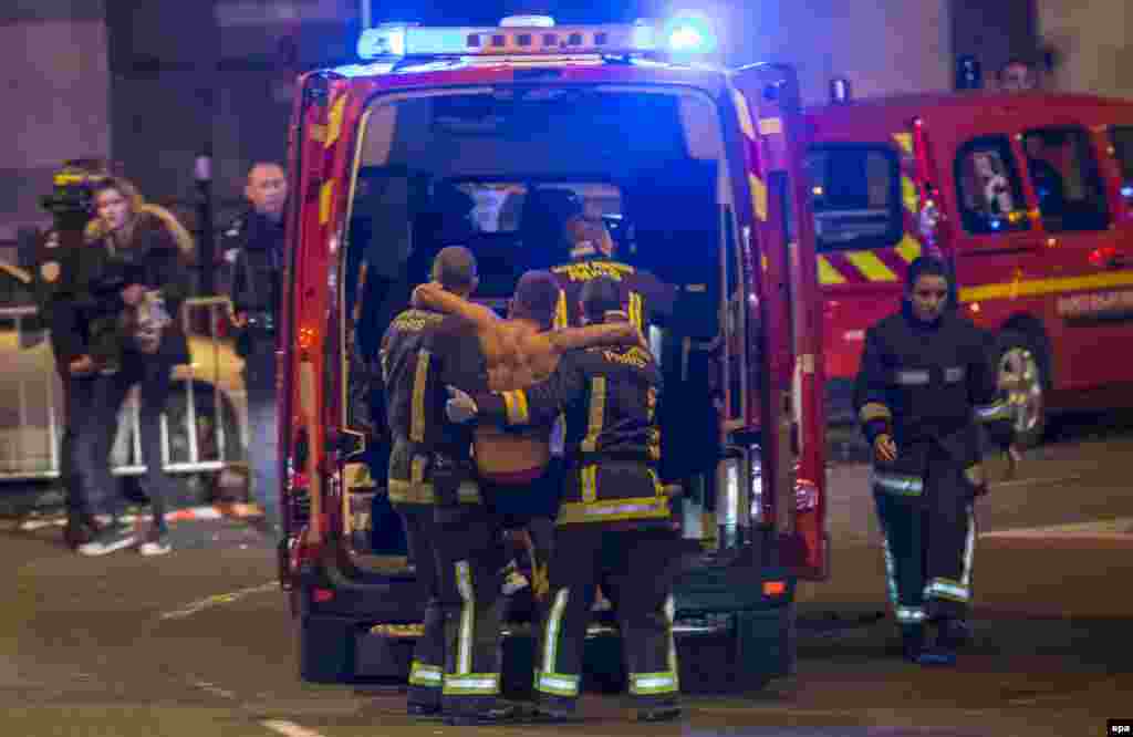 A wounded man evacuated from the Stade de France.