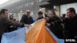 Opposition supporters set up tents around the presidential residence in Tbilisi.