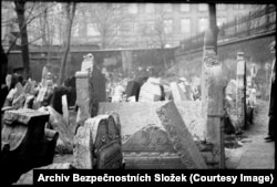 Other images apparently miss their target, but capture evocative moments like this photo in Prague’s Old Jewish Cemetery.