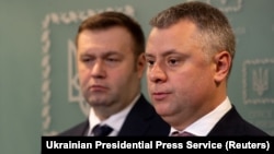 Ukrainian Energy Minister Oleksiy Orzhel (left) and Yuriy Vitrenko, executive director of Naftogaz, attend a news conference in Kyiv on December 21. 