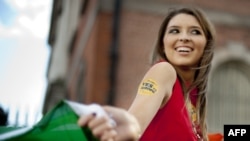 A woman celebrates in Dublin on October 3 after results suggested an overwhelming "yes" in Ireland's Lisbon Treaty referendum one day earlier.