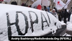 Opposition supporters celebrate the news of Lutsenko's release at a rally in Kyiv.