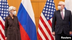 U.S. Deputy Secretary of State Wendy Sherman (left) and Russian Deputy Foreign Minister Sergei Ryabkov arrive for security talks at the United States Mission in Geneva on January 10.