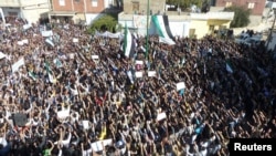 Antiregime protesters gather in Hula, near Homs, on November 13.