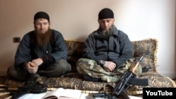 Abu Umar al-Shishani (left), reportedly in Syria