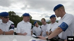 Observers from an EU monitoring mission in the village of Odzisi, about 50 kilometers from the Georgian capital, in late 2008