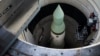 An unarmed Minutemen intercontinental ballistic missile is seen in its launch tube at a launch facility just outside Wall, South Dakota.