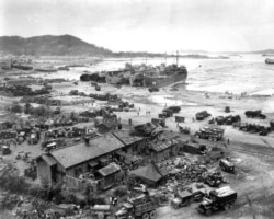 Troops and equipment being unloaded at Inchon on September 15, 1950.