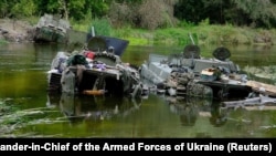 Armored fighting vehicles abandoned by Russian soldiers are seen during a counteroffensive operation of the Ukrainian forces in the Kharkiv region on September 11.