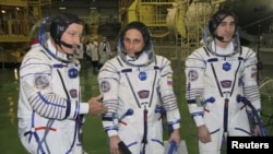 U.S. astronaut Daniel Burbank and Russian cosmonauts Anton Shkaplerov and Anatoly Ivanishin (left to right) during training at the Baikonur cosmodrome in early November.