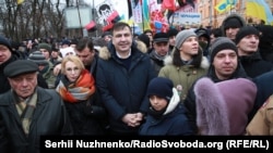 Mikheil Saakashvili marches with supporters in Kyiv on February 4.