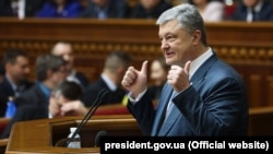 Ukrainian President Petro Poroshenko gives a speech before the Verkhovna Rada in Kyiv on February 7.