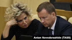 Denis Voronenkov and his wife, Maria Maksakova (left), who is also a former Russian lawmaker, left Russia for Ukraine in October 2016 after the Russian Prosecutor-General's Office refused to launch a probe against his alleged involvement in an illegal property seizure in Moscow. 