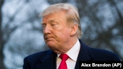 U.S. President Donald Trump turns to depart after speaking with the media on the South Lawn of the White House in Washington, D.C., on March 24.