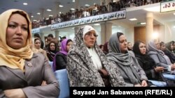 Delegates listen to Afghan President Hamid Karzai speak during the first day of the Loya Jirga on November 16.