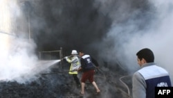 The scene at a UN aid compound in Gaza after it was shelled by Israeli forces