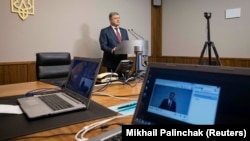 The deputy head of his administration was worried Ukrainian President Petro Poroshenko's video testimony in former President Viktor Yanukovych's treason trial would be hacked.