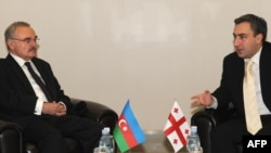 Georgian Prime Minister Nika Gilauri (right) meets with Azerbaijani Prime Minister Artur Rasizade in Batumi ahead of the summit.