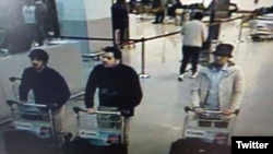 The Belgian authorities released this image, which they believe shows three suspected Brussels airport attackers.