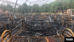 Four children died in the fire at the Kholdomi camp in July 2019. 