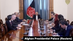 Afghan President Ashraf Ghani (center) meets with U.S. special representative for Afghanistan Zalmay Khalilzad (3rd left) in Kabul on September 2.