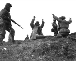 Chinese communist troops captured during fighting near Hoengsong, South Korea, in March 1951.