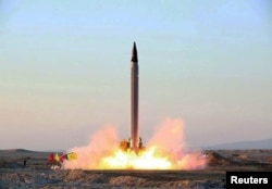 An Iranian Emad rocket is test-launched at an undisclosed location in October.