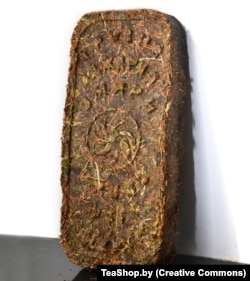 A brick of low-grade Georgian tea pressed with Soviet machinery.