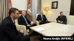 A meeting in late May of newly elected President Tomislav Nikolic (second from left), former President Boris Tadic (second from right) and (right) Ivica Dacic in Belgrade.