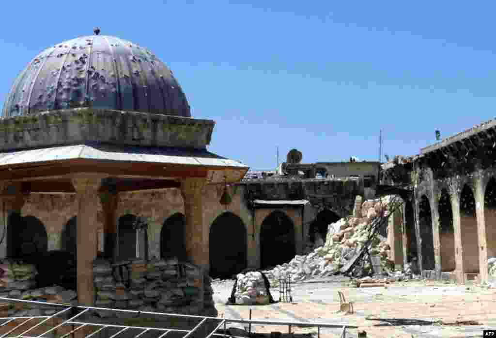 The rubble of the minaret of Aleppo&#39;s ancient Umayyad Mosque, located in the UNESCO-listed Old City of the northern Syrian city, after it was blown up on April 24, 2013. The iconic mosque in Aleppo&#39;s labyrinthine Old City has been a key battleground since July 2012, with rebels seeking the ouster of Bashar al-Assad&#39;s regime laying siege twice but each time managing only to keep control for less than 48 hours.