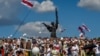 Belarus opposition supporters attends a rally in central Minsk