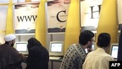 Iranians flock to Internet cafes in Tehran.