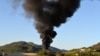 Smoke rises after shelling in the Al-Turkman Mountains in Syria's western Latakia Province on April 25. The United States said last week that it has evidence that chemical weapons have been used during the conflict in Syria. 